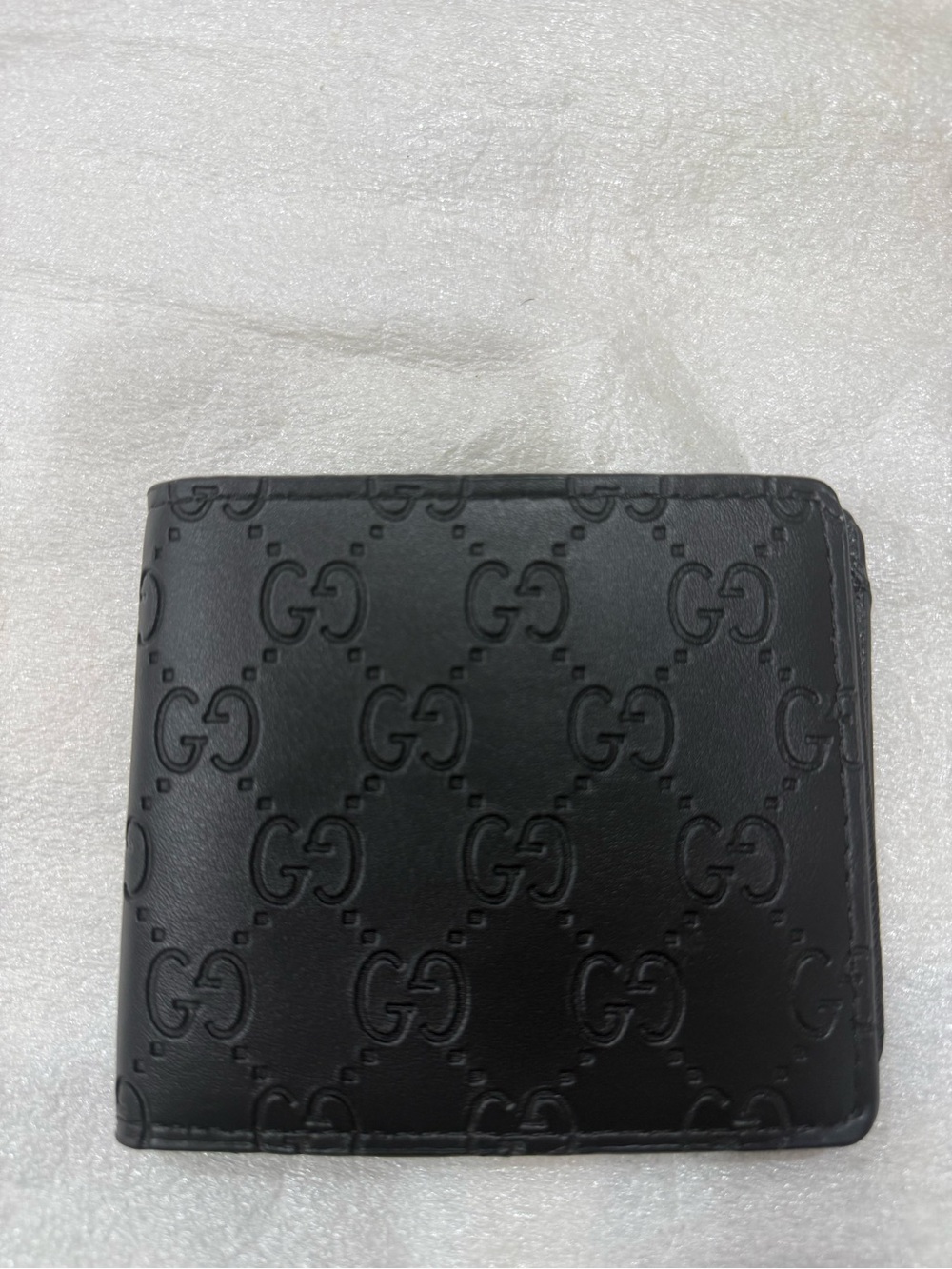 Gucci Black Embossed GG Leather Bifold Card Holder